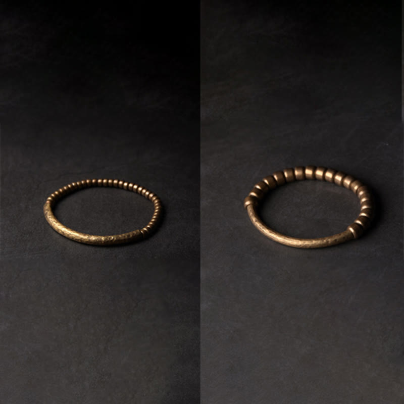 Bracelet porte-bonheur en perles de cuivre et de laiton au design simple Buddha Stones