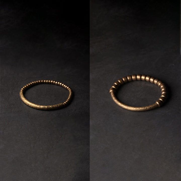 Bracelet porte-bonheur en perles de cuivre et de laiton au design simple Buddha Stones