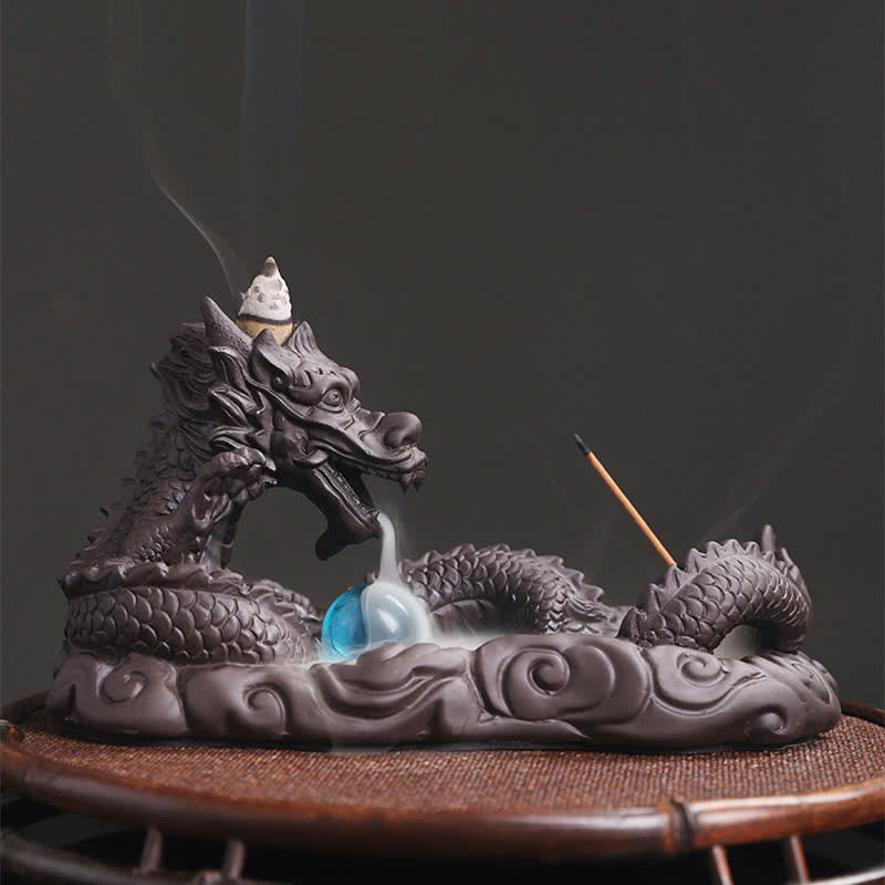 Brûleur d'encens de protection de fleur de dragon jouant à la balle