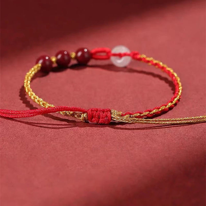 Bracelet de bénédiction avec boucle de paix en jade cinabre naturel de Buddha Stones
