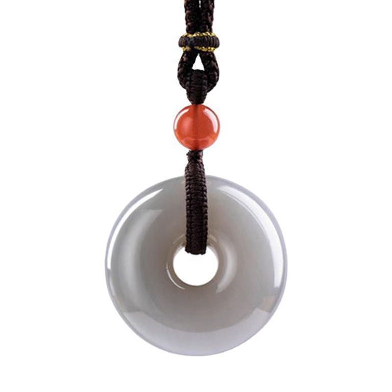 Collier pendentif porte-bonheur en jade gris rond naturel Buddha Stones