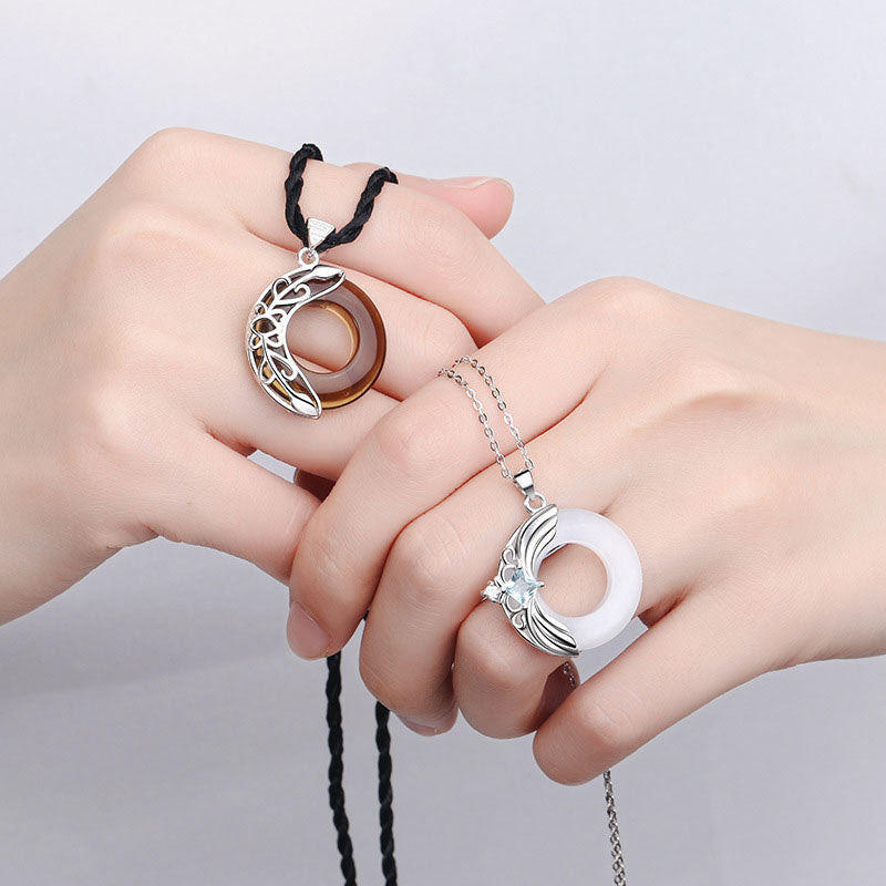 Collier pendentif porte-bonheur en cuivre avec ailes d'amour