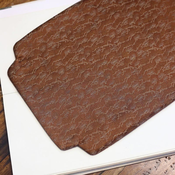 Dessous de verre élégant à motif de brocart floral pour tasse à thé