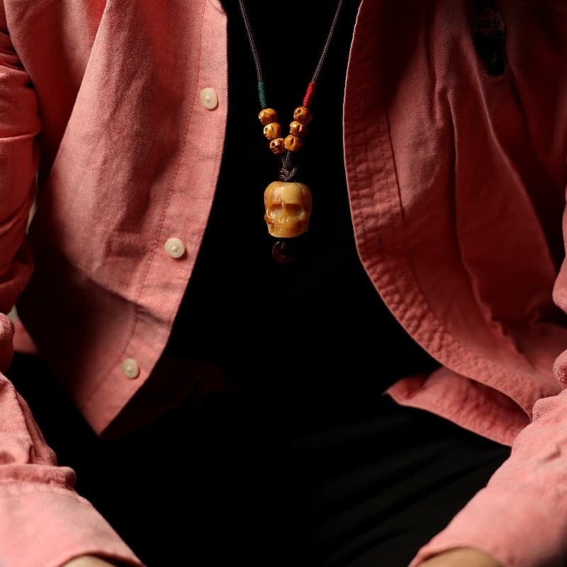Collier pendentif en os de chameau tibétain Buddha Stones et crâne du Seigneur des cadavres