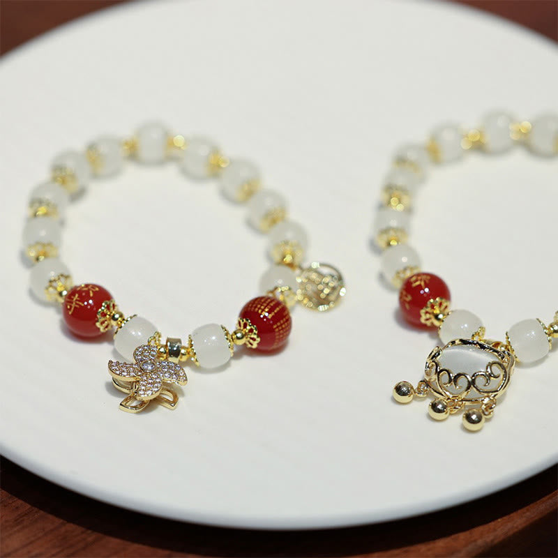 Bracelet de bénédiction avec breloque en forme de moulin à vent en Buddha Stones et caractère Fu