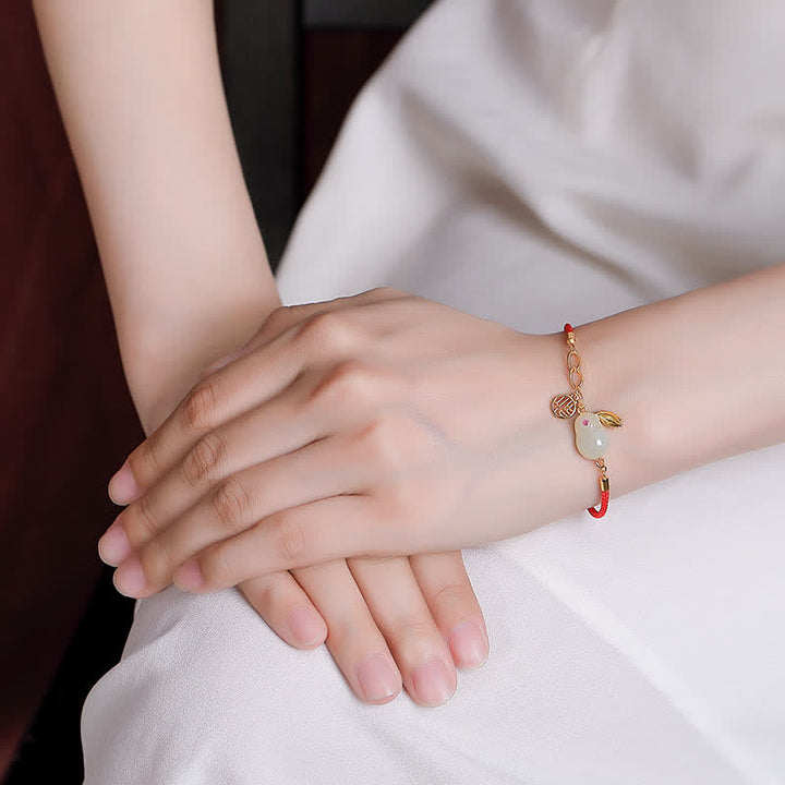 Bracelet en argent sterling 925 avec cordon rouge et jade blanc Hetian de l'année du lapin