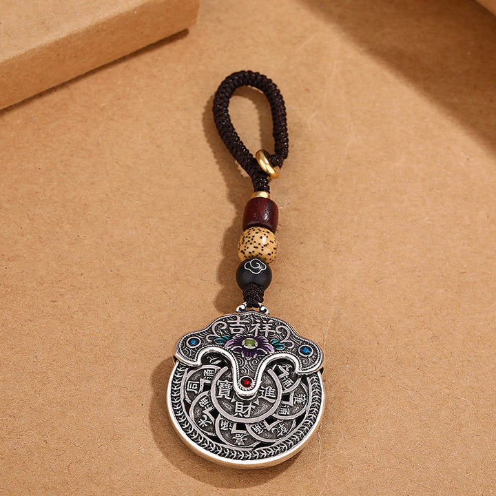 Porte-clés en cuivre Buddha Stones et fleur de pivoine