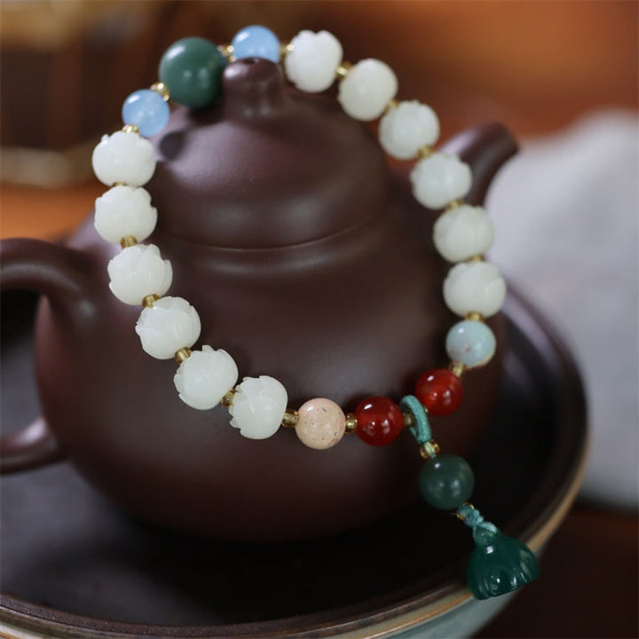 Bracelet de paix et d'harmonie sculpté en perles de lotus et graines de Bodhi en Buddha Stones