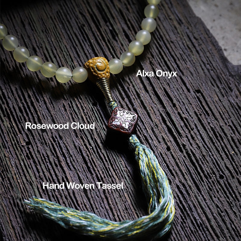 Bracelet porte-bonheur en ambre avec 108 Buddha Stones de Mala en corne de mouton du Tibet