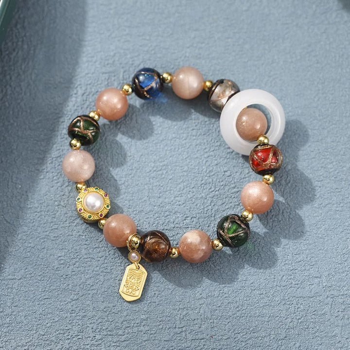 Buddha Stones Encens tibétain Cendres Verre Liuli Pierre Tridacna Pierre de Soleil Om Mani Padme Hum Bracelet à breloques pour roue de prière