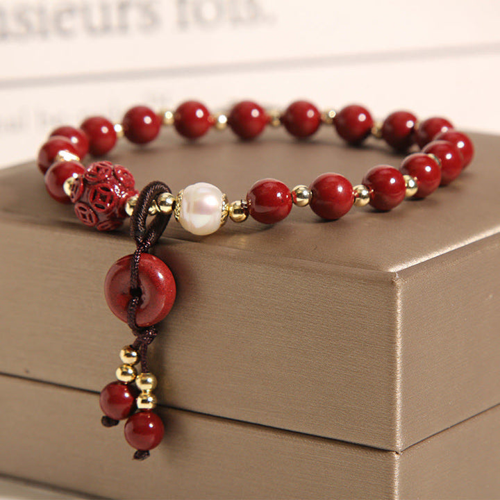 Bracelet de bénédiction avec breloque en cuivre et boucle de paix en cinabre naturel Buddha Stones