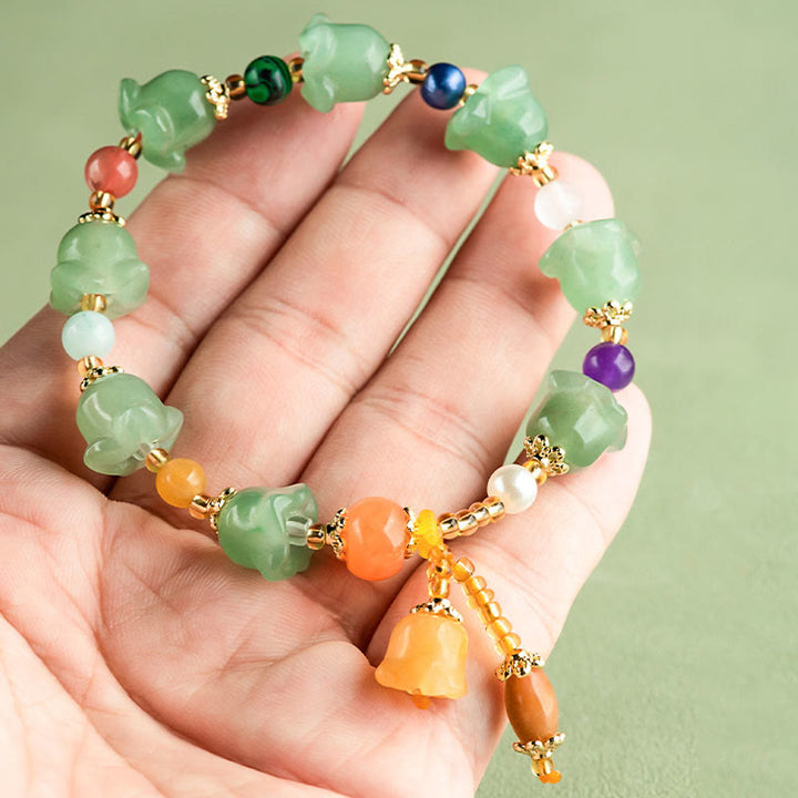 Bracelet porte-bonheur en aventurine verte et fleur de magnolia de Buddha Stones
