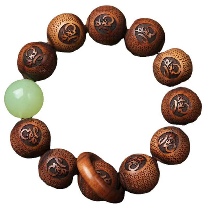 Bracelet de protection du tigre gravé en bois de rose tibétain Buddha Stones