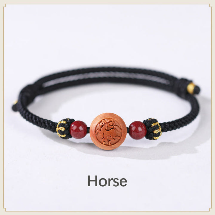 Bracelet de richesse en bois de pêche naturel Buddha Stones et caractère Fu du zodiaque chinois sculpté en cinabre