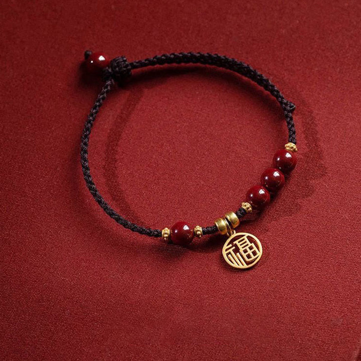 Bracelet tressé avec breloque et bénédiction en perles de cinabre et Buddha Stones