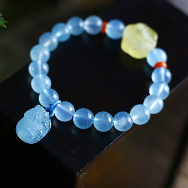 Bracelet à breloques de guérison et de paix Pixiu en ambre et aigue-marine naturelle - Bleu vert - image 0