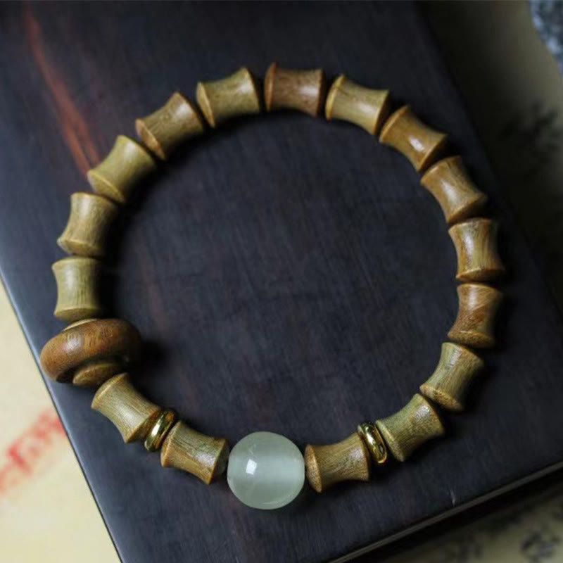 Bracelet de paix en bambou et bois de santal vert et ébène avec Buddha Stones