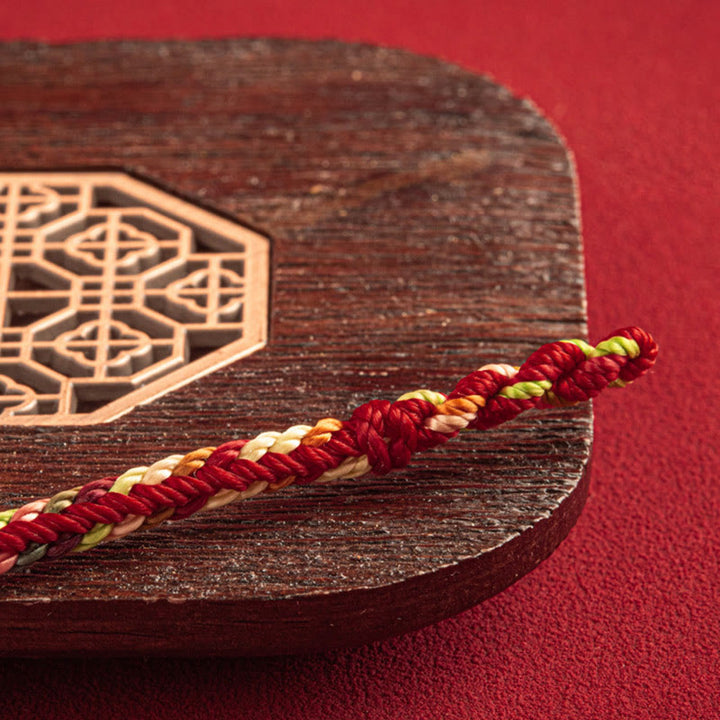 Bracelet multicolore Buddha Stones « Que l'année à venir soit une année de sécurité et de chance »