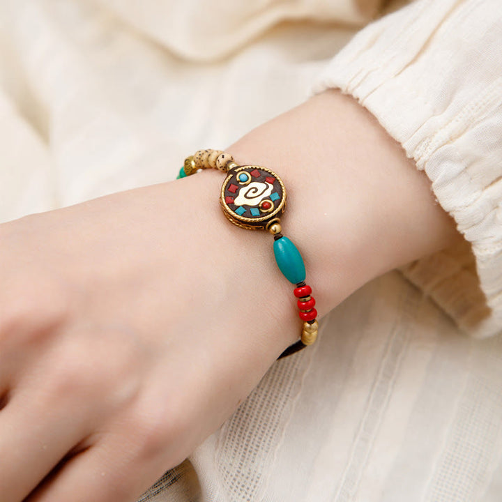 Bracelet de force de protection Om Mani Padme Hum en Buddha Stones tibétaines turquoise