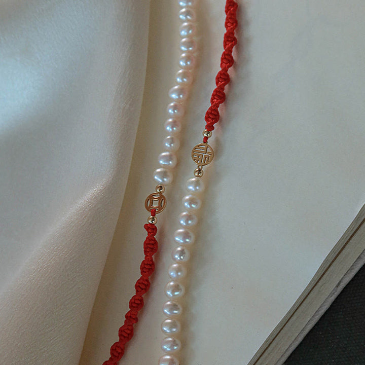 Bracelet tressé en fil rouge avec perles de protection et de chance plaquées or 14 carats