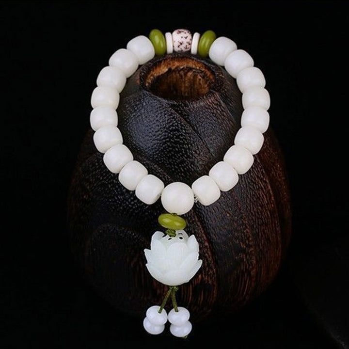 Bracelet porte-bonheur en Buddha Stones et lotus blanc naturel