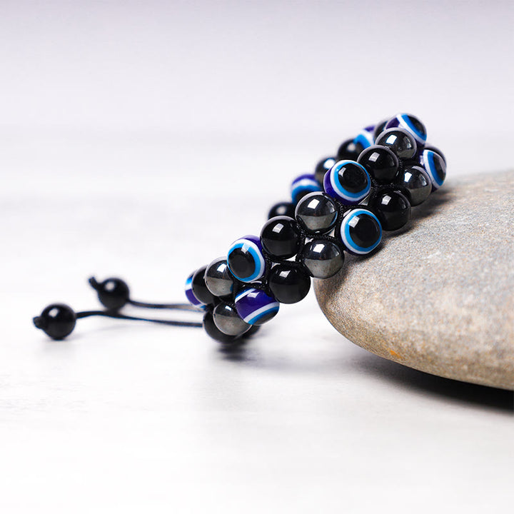Bracelet de perles de protection contre le mauvais œil en hématite et œil de tigre Buddha Stones