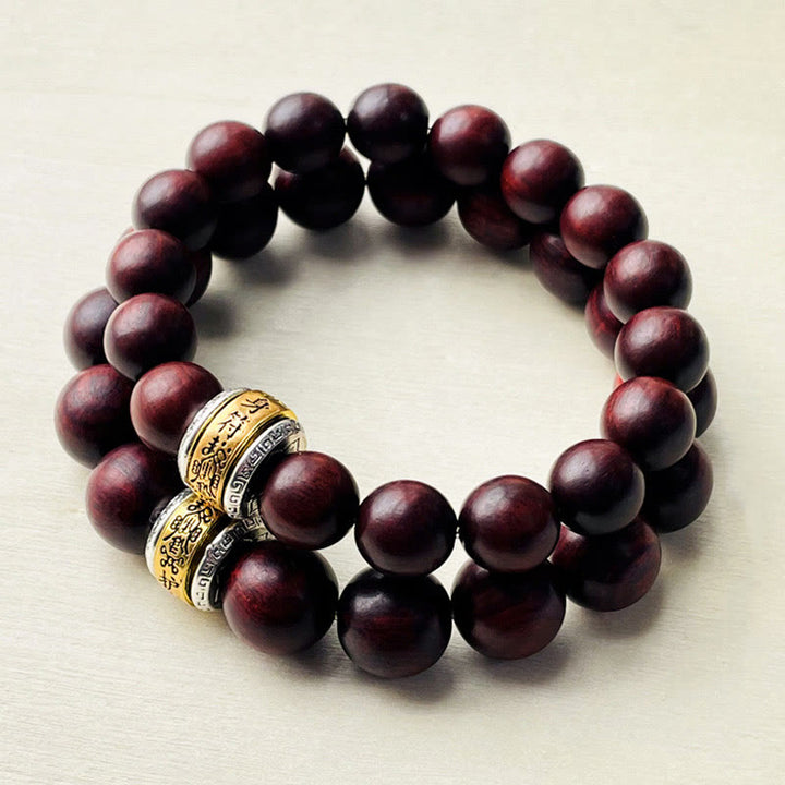 Bracelet de protection en amulette de petite feuille de bois de santal rouge de Buddha Stones